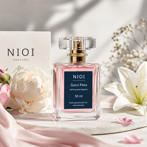 NIOI Gucci Flora perfume bottle with flowers on a light background